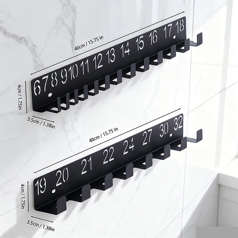 Wandhalter aus Metall mit nummerierten Plätzen für Schrauben und Schlüssel